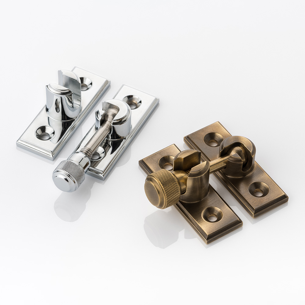 Ball & socket sash window fastener